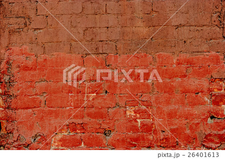 Old brick wall half painted in deep red, half in Old brick wall half painted in deep red, half in 26401613