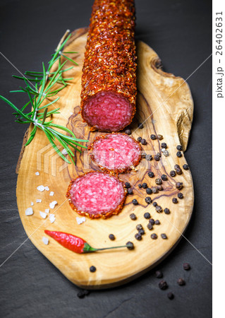dried salami crusted in ground red pepper dried salami crusted in ground red pepper 26402631
