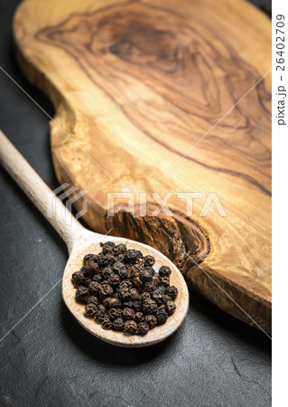 black pepper on rustic wooden table 26402709