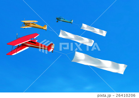 Flying airplane and banner on blue sky.  26410206