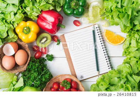 Fresh vegetables and fruit on wood background 26410815