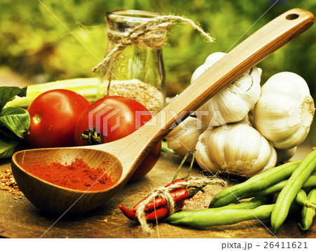 vegetables on wooden kitchen with spicies, tomato 26411621