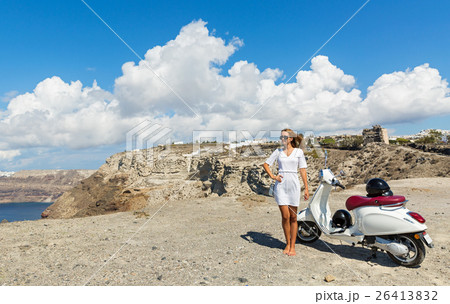 Woman with white motorcycle Woman with white motorcycle 26413832