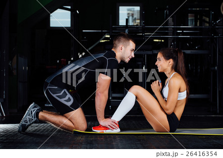 Woman doing abdominal crunches press exercise on Woman doing abdominal crunches press exercise on 26416354
