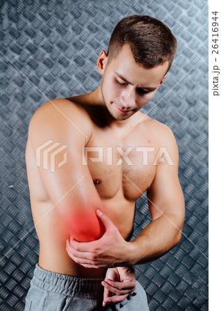 Strong fitness man feeling pain. 26416944