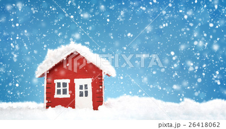 Small red house model covered with snow Small red house model covered with snow 26418062