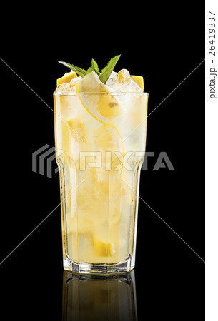 Citrus cocktail over black background 26419337