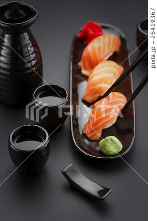 Japanese cuisine. Sushi roll with soy sauce Japanese cuisine. Sushi roll with soy sauce 26419367