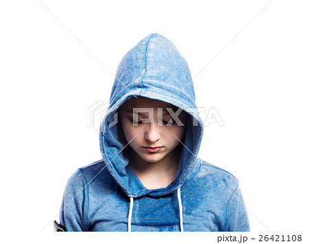Teenage girl in blue sweatshirt. Studio shot Teenage girl in blue sweatshirt. Studio shot 26421108