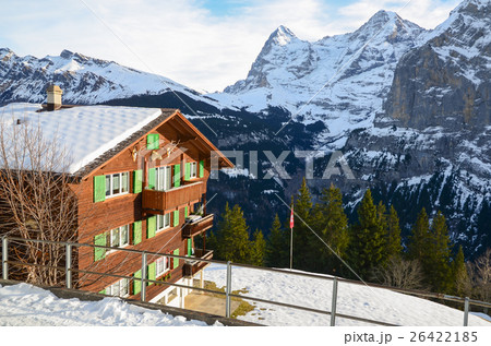 Traditional Swiss House and Alps mountains 26422185