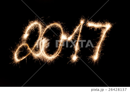 2017 written in sparklers . Happy New Year ! 26428137