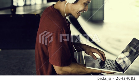 Teenager Style Listening Music Headphone Street Concept 26434083