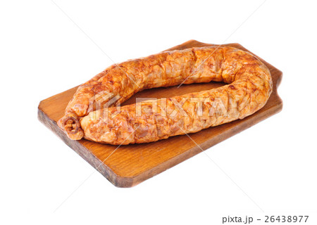 sausage on cutting board isolated on white  26438977
