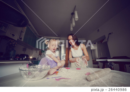 mother and daughter in the kitchen 26440986