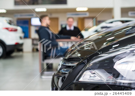 Winter tires in showroom of a car dealer 26445409