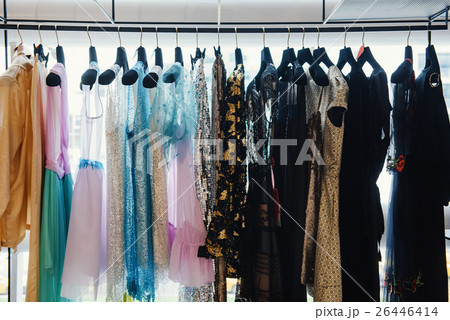 Clothes on racks in a fashion boutique Clothes on racks in a fashion boutique 26446414