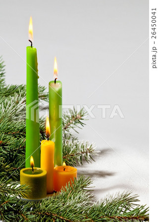 Five flaming candles on the grey background 26450041