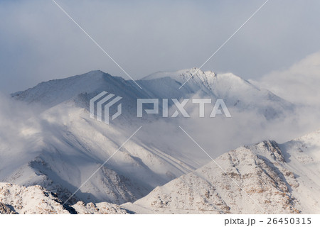 cloudy snow mountain in winter cloudy snow mountain in winter 26450315