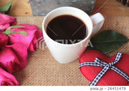 Coffee with coffee beans and red hearts. 26451479