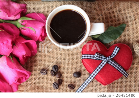 Coffee with coffee beans and red hearts. 26451480