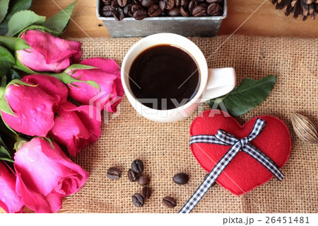 Coffee with coffee beans and red hearts. 26451481