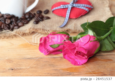 Coffee with coffee beans and red hearts. Coffee with coffee beans and red hearts. 26451537