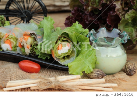 Salad rolls vegetable with tuna and crab stick. 26451616