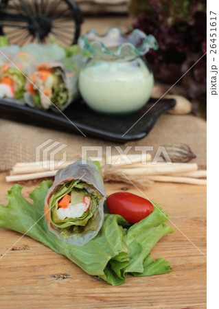 Salad rolls vegetable with tuna and crab stick. 26451617