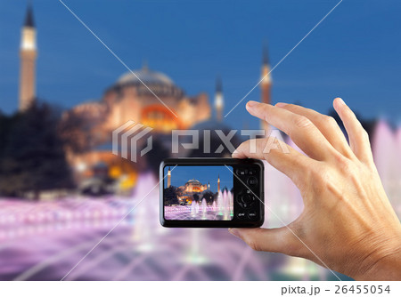 Travel concept. Hands making photo of night city Travel concept. Hands making photo of night city 26455054