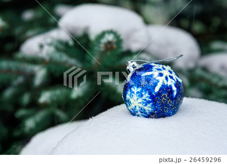 Blue Christmas Ball on snow Blue Christmas Ball on snow 26459296