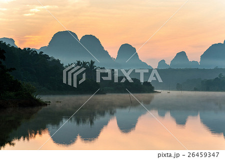 Sunrise and reflections at Nongtalay lagoon Sunrise and reflections at Nongtalay lagoon 26459347