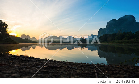 Sunrise and reflections at Nongtalay lagoon Sunrise and reflections at Nongtalay lagoon 26459348