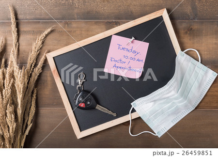 paper note doctor appointment on blackboard  26459851