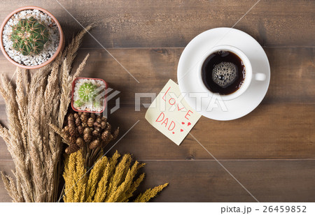 black coffee with paper note wood background black coffee with paper note wood background 26459852