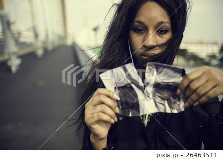 African Woman Sadness Listening Music Tearing Photo Breakup Conc African Woman Sadness Listening Music Tearing Photo Breakup Conc 26463511
