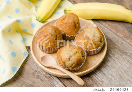 Banana muffins cupcake on wooden background Banana muffins cupcake on wooden background 26466423