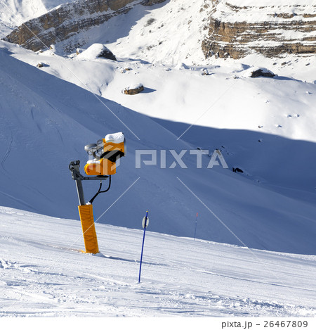 Ski slope with snowmaking on winter resort Ski slope with snowmaking on winter resort 26467809