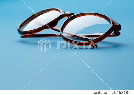 Folded brown spectacles close up 26468100