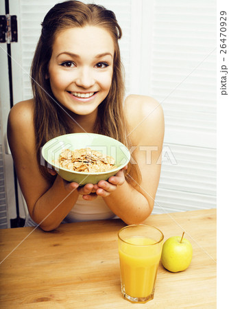 portrait of happy cute girl with breakfast, green portrait of happy cute girl with breakfast, green 26470929