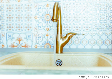 Golden faucet with sink Golden faucet with sink 26471475