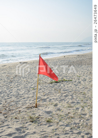 Red warning flag on the beach, no swimming Red warning flag on the beach, no swimming 26473649