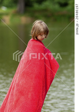 Boy in Red Towel Standing on Jetty by a Lake 26486197