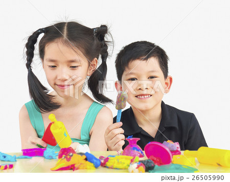 Selective focused of happy Asian kids playing clay 26505990