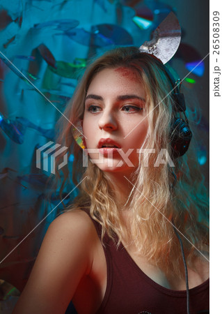 Woman with bloody cd parts sticking out of head. 26508309