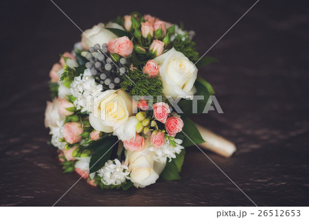 Close up of beautiful wedding bouquet on dark Close up of beautiful wedding bouquet on dark 26512653