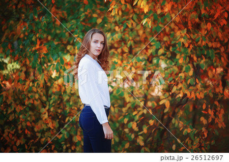 Young beautiful woman. Girl in bright autumn park 26512697