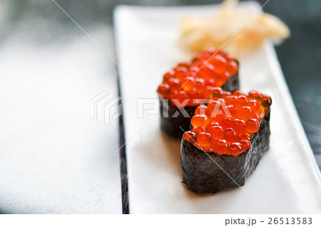 Fresh Salmon eggs sushi on plate 26513583