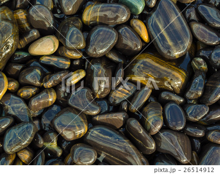 Background of round colored sea pebbles texture Background of round colored sea pebbles texture 26514912
