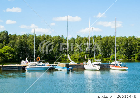 Boats and yachts at old pier 26515449