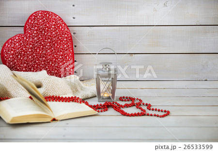Christmas still life with lantern and red beads Christmas still life with lantern and red beads 26533599